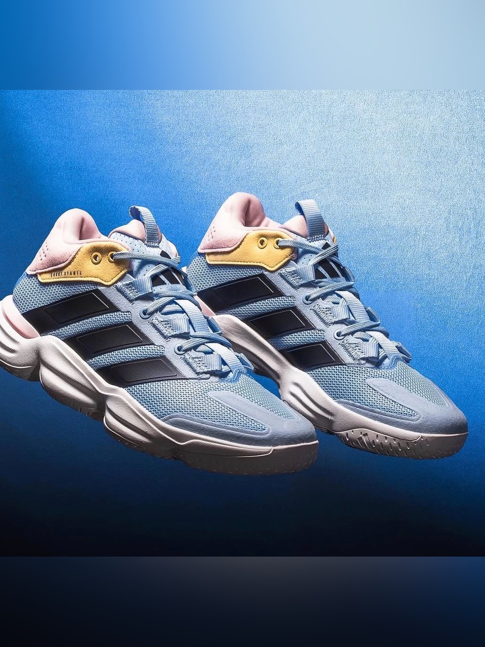 adidas Women’s Light Blue Sneakers with Pink & Yellow Accents